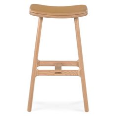 a wooden stool with leather seat and backrests on an isolated white background photo