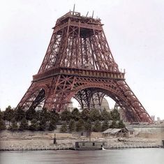 the eiffel tower stands tall over the water