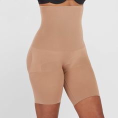 Our Remarkable Results mid-thigh shaping short uses breathable, comfortable compression to tone the tummy and thighs, and also give you a perky rear view. Best of all? The high-waist construction provides added tummy control and eliminates muffin top, while the lightweight, seamless design offers sleek, easy wear for every day. Shaping Tights, Shapewear Dress, Waist Shapers, Shapewear Bodysuit, Muffin Top, Black High Waist, Easy Wear, High Waisted Shorts, Shapewear