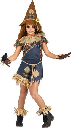 This costume includes: dress with attached collar, belt, hat, gloves, boot cuffs, prop crow. *Shoes not included.  Manufacturer's size guide: Size Height Weight Waist Chest 3T-4T 38-46" up to 36 lbs - - Small (4-6) 39-46" 35-45 lbs 19-22" 22-25" Medium (8-10) 49-54" 55-73 lbs 23-25" 27-30" Large (12 -14) 55-60" 74-100 lbs 24-26" 30-32 Scary Crow, Wizard Of Oz Play, Crow Costume, Scarecrow Costume, Creepy Costumes, Brown Gloves, Tunic Designs, Rope Belt, Fun World