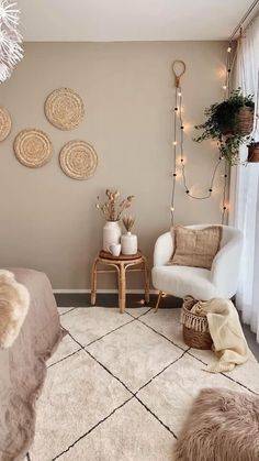 a bedroom decorated in neutrals and whites with wicker baskets hanging on the wall