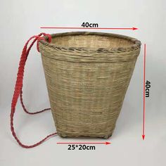 the measurements of a basket with red string