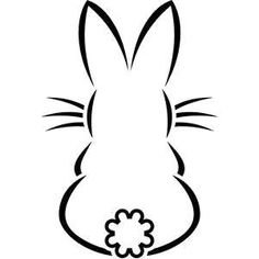 the outline of a rabbit's head with a flower in its mouth