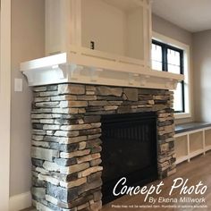 an empty room with a stone fireplace in it