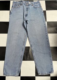 "Description ref: l194 tag : levis 560 made in: usa condition: distressed condition.please refer photo .this is used vintage item , please dont expect condition will be like new\" size on tag : 34 waist:33 length (outseam): 40 inch inseam: 29.5 inch thigh: 12.5 inch front rise: 12.5 inch back rise: 17 inch leg opening:8 inch materials: cotton important i am the possibility of human common forget something told there. we try to tell about the item of detailed. please let i know if u has doubtful Levis 560, 90s Levis, Black Hollywood, Jeans Levis, Loose Fit Jeans, Levis Men, Levis Jeans, Jean Outfits, Fit Jeans