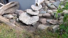 a pile of rocks sitting next to a building