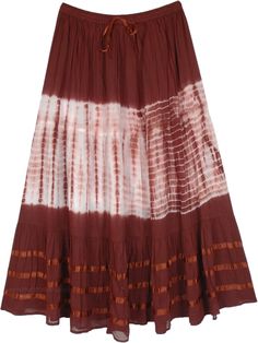 A skirt with a distinct style for this summer due to its white tie dye offset and ribbon details that add a unique character to the overall look.  This three panel skirt is made of 100% soft cotton with matching ribbons at the waistband and at the bottom. #tlb #MaxiSkirt #vacationclothing #beachwrap #TieDye #bohemianfashion #BrownSkirt #VacationSkirt #BeachSkirt #Ribbon Brown Cotton Summer Skirt, Summer Cotton Brown Skirt, Cotton Tie Dye Skirt For Summer, Summer Cotton Tie-dye Skirt, Summer Cotton Tie Dye Skirt, White Hippie Skirt For Spring, Spring Tie-dye Tiered Skirt, Tie Dye Tiered Skirt For Summer, Coco Calypso