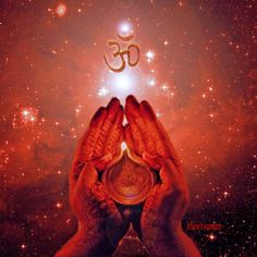 two hands holding an object in front of a star filled sky with the word om written on it