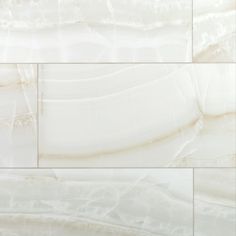 an image of white marble tiles that look like they have been painted