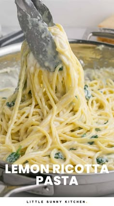 a spoon full of lemon ricotta pasta with spinach