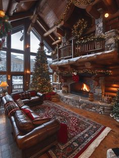 a living room filled with furniture and a fire place covered in christmas decorations next to a large window