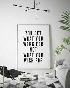 a black and white poster with the words you get what you work for not what you wish for