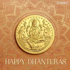 a gold coin with the words happy dhanteras written in white lettering on it