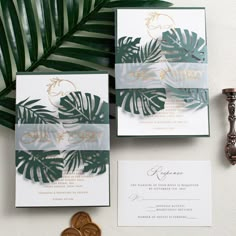 wedding stationery with tropical leaves and gold foil