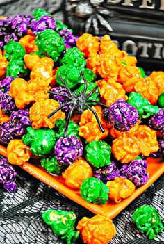 a plate full of halloween candies on a table