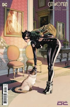 a woman in black catsuit standing next to a cat sitting on the floor near a dog