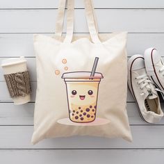 Boba Tea Library Book Bag, Cotton Canvas Tote Bag, Trendy Teen Gifts, Cute Boho Bag, Kawaii Tote Bag  This 100% cotton bag comes in one size - 15" x 16"- perfect for everyday wear. While the canvas material will show off your designs in great colors, it's durable and will last for years. The bag features 20" handles (made from the same canvas), making it easy to carry even with a week's worth of shopping. .: 100% cotton canvas .: Heavy fabric (12 oz/yd² (406.9 g/m .: Sewn-in label WE DO NOT ACCEPT EXCHANGES, RETURNS OR CANCELLATIONS We add our size chart as a reference, so please make sure that you are selecting carefully. Once an order is received it goes into production and we are unable to cancel orders. White Kawaii Canvas Bag As Gift, Kawaii Beige Rectangular Shoulder Bag, Kawaii Rectangular Gift Bag, Kawaii Rectangular Canvas Bag Gift, Kawaii Beige Bags Perfect For Gifts, Kawaii Beige Bag As Gift, Kawaii Beige Bag For Gift, Kawaii Beige Pouch Bag, Kawaii White Gift Bag