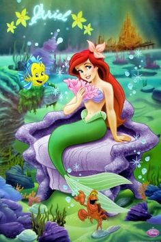 the little mermaid is sitting on an underseal