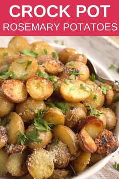 a white bowl filled with cooked potatoes and parsley on top of it, text reads crock pot rosemary potatoes