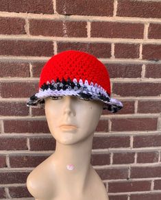 Red crochet hat with black, white, and grey  brim.  15cm height  58cm circumference Adjustable Brimmed Red Crochet Hat, Red Crochet Hat With Adjustable Short Brim, Red Brimmed Crochet Hat Made Of Yarn, Red Adjustable Crochet Bucket Hat, Red One Size Crochet Bucket Hat, Casual Red Brimmed Mini Hats, Red Brimmed Crochet Hat, Adjustable Red Crochet Hat, Adjustable Red Crochet Yarn Hat