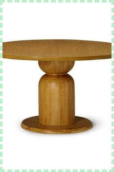 an oval wooden table with two pedestals on each side and a green checkered background