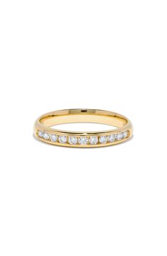 a yellow gold band with white diamonds