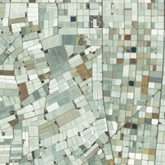 an aerial view of a patchwork area with many different colors