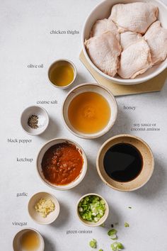 ingredients for chicken wings laid out in bowls on a white surface with text above them