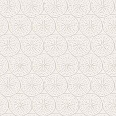 a white and beige wallpaper with circular designs