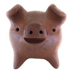 a brown piggy bank with two holes in it's face