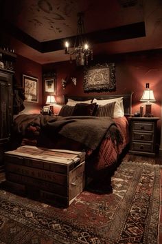 a bed room with a neatly made bed and two night stands on the floor next to it