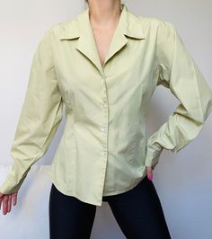 A lovely mint green shirt, with a lime tint, 100% high quality cotton.  Mint condition and super cute and unique cut.  Size XS-M, even a smaller L, depending on the desired fit. Composition: 100% soft cotton. The model is a size XS- S. Note: If you have any additional questions about the sizing and measurements of the items, please DM me! *all items have been professionally cleaned and ready to wear! Most of the items are vintage and therefore may have some natural wear. While this may sound lik Casual Light Green Long Sleeve Tops, Trendy Green Collared Shirt, Casual Light Green Long Sleeve Blouse, Light Green Short Sleeve Cotton Top, Pastel Long Sleeve Cotton Tops, Light Green Cotton Short Sleeve Top, Trendy Light Green Spring Tops, Trendy Light Green Tops For Spring, Trendy Light Green Spring Top