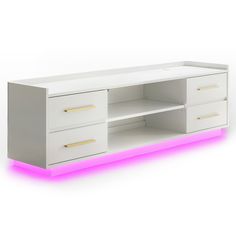 a white entertainment center with two drawers and neon lights on the bottom part of it