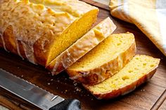 sliced loaf of bread sitting on top of a cutting board