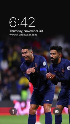 two soccer players standing next to each other in front of an iphone screen with the same time