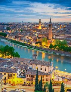 an aerial view of the city and river