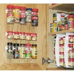 the spice rack is full of spices and seasonings in it's cupboards