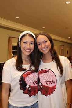 two young women standing next to each other