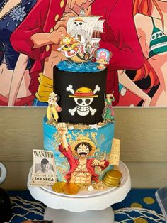 a pirate themed birthday cake on top of a table