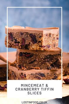 chocolate and cranberry bars stacked on top of each other