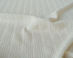 closeup of white knitted fabric texture