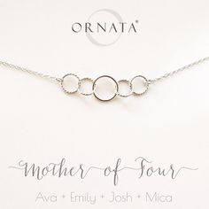 "\"MOTHER OF FOUR\" STERLING SILVER NECKLACE ON PERSONALIZED JEWELRY CARD | ONE ADULT & FOUR CHILDREN  Delicate and simple sterling silver necklaces that symbolically represent friends and family. Necklaces from this collection come on jewelry cards which include the option of printing the names of your choice directly onto the cards. Families come in all shapes and sizes. This design features one large and four small sterling silver interlocking rings, symbolizing wholeness and love without end.  PERSONALIZE THE JEWELRY CARD  You have the option to have the jewelry card for this piece personalized with the names of your choice. Please enter the names you'd like printed on the card, separated by commas, or write 'no name' in the box to omit printing on your enclosed jewelry card. You must Necklace Friends, Mother Of Four, Our Universe, Family Necklace, Family Jewellery, Mothers Necklace, Sterling Silver Necklace, Gift Necklace, Sterling Silver Necklaces