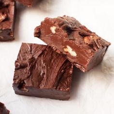 pieces of chocolate fudge with nuts on top