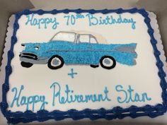 a blue and white birthday cake with a car on it