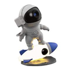 an astronaut is riding on top of a rocket with his arms outstretched and legs spread out