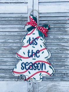 this is an image of a sign that says tis the season with a christmas tree on it