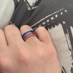 Beautifully polished stainless steel ring, with vibrant enamel stripes encircling the entire band, in the colors of the Bi pride flag. This ring is perfect for your wedding, anniversary, pride event, or just because! Buy one for a friend or loved one, and one for you too! Stainless Steel 6 mm wide band Not sure of your size? Click here to view our Ring Size Guide including an easy way to measure your own finger for accurate sizing. Our rings are in U.S. sizing. Click here if you need our Interna Pride Rings, Bisexual Pride Flag, Kinds Of Hats, Rainbow Ring, Bisexual Flag, Pride Flag Colors, Prom Accessories, Rainbow Rings, Stainless Steel Ring