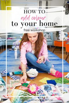 a woman is sitting on the floor working on her crafts