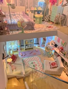 the inside of a doll house with furniture and accessories