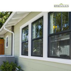 an image of a house with windows and siding